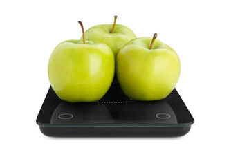 Electronic scales with ripe green apples on white background