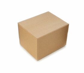One closed cardboard box on white background