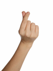 Woman showing heart gesture on white background, closeup of hand