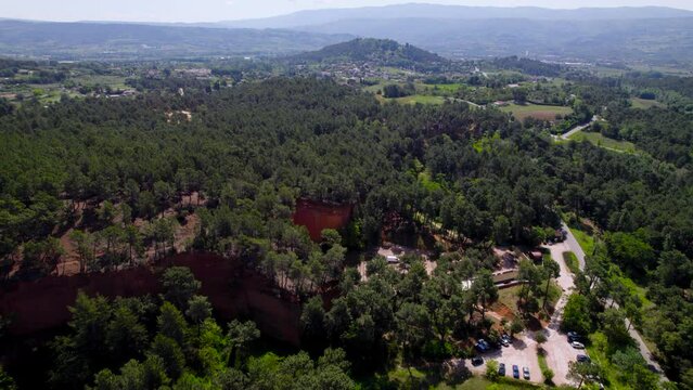 Establishing shot looking down on a DJ outside the Bruouz Mines, France