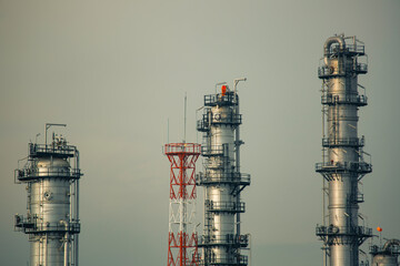 Scene evening of tank oil refinery plant tower and column distillery smok © chitsanupong