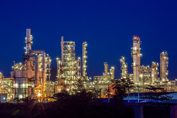 Twilight scene of tank oil refinery plant and tower column of Petrochemistry © chitsanupong