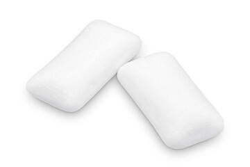 Three pieces of white chewing gum isolated on white. The whole subject is in focus.