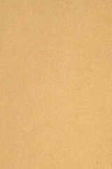 Fototapeta na wymiar Seamless vertical texture of durable cardboard, detailed surface of yellow recycled cardboard