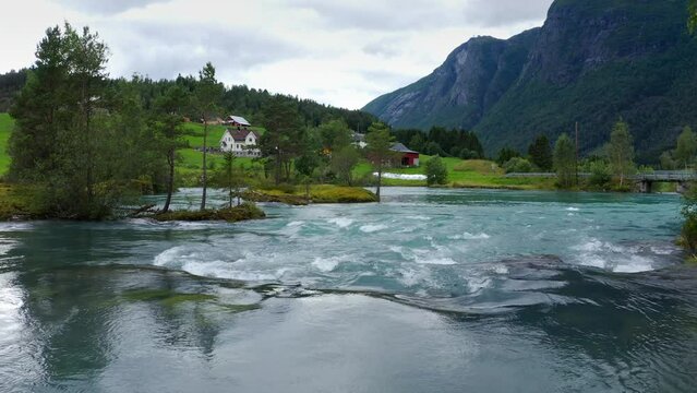 Stryn village and blue lake, beautiful nature of Norway lakes and mountains, Aerial