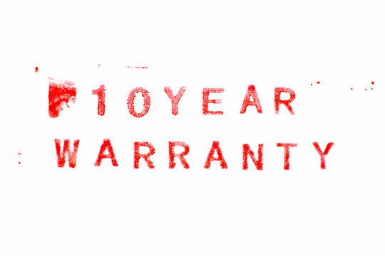 Red color ink rubber stamp in word 10 year warranty on white paper background
