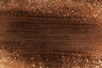 Tyre track on dirt sand or mud, Picture in retro or grunge tone. Car drive on sand. off road track....