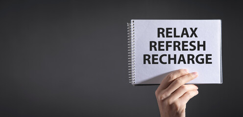 Relax, Refresh, Recharge on notepad.