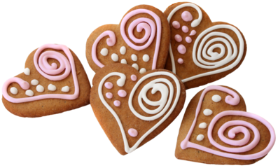 Five home made heart shape ginger breads decorated with pink and white sugar glazing isolated