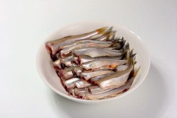 The smelt or European smelt (Osmerus eperlanus) in a plate