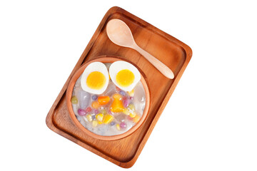 Thai desserts with coconut milk and small rolls and cooked eggs (Khanom Bua Loi)