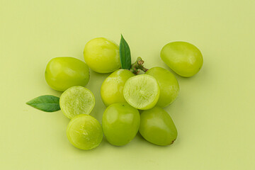 A bunch of Shine Muscat green grape on green background