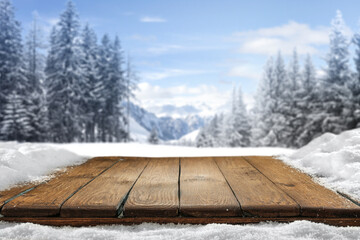 Desk of free space cover of snow flakes and winter landscape.  - 546293257