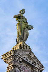 Obraz premium Architectural fragments of old Amsterdam building: XIX century Neo-Renaissance-style building, former Town Hall and Archive of Amstel Community Amsterdam, The Netherlands.