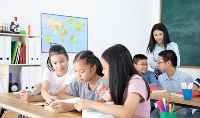 asian elementary school children  learning in classroom