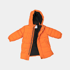 Orange children's winter autumn jacket with a hood isolated on gray background. Waterproof jacket for child, warm down jacket. Cutout clothing mockup. Fashion, style, outerwear