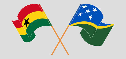 Crossed and waving flags of Ghana and Solomon Islands