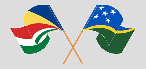 Crossed and waving flags of Seychelles and Solomon Islands