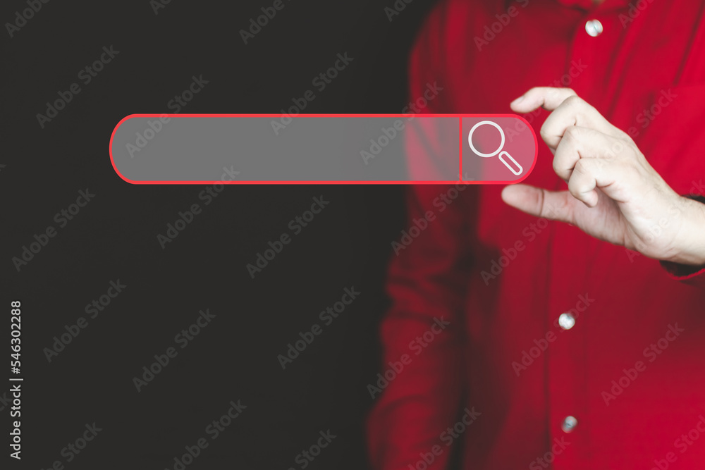 Wall mural search engine optimization concept man's hand using a computer to search for information on the inte