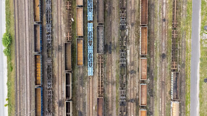 
drone view of freight cars in the train yard