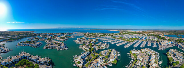 Aerial view above the impressive and large marina of Port Camargue in the south of France