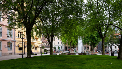 Fototapeta na wymiar Europe buildings and trees in a park