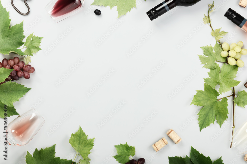 Wall mural Flat-lay of red, rose and white wine in glasses on white backgroun, mock up, templated