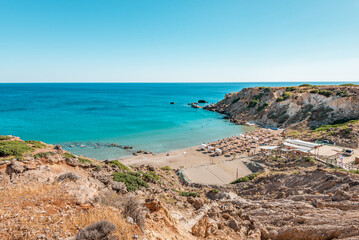 ammoudi beach, crete island, greece: beautiful sandy coast with natural environment near the cretan cities of makry Gialos and iearapetra - obrazy, fototapety, plakaty