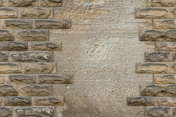 background stone wall with a copy of the space. Stone masonry close-up. Frame of bricks