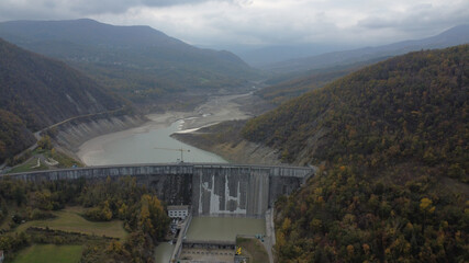 drone view Mignano Dam in Arda Valley, Castell'Arquato, Piacenza, Italy in fall