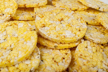 Puffed Corn Cake Texture Background, Corn Diet Bread with Fragrant Herbs and Spices, Waffle with Corns Pattern