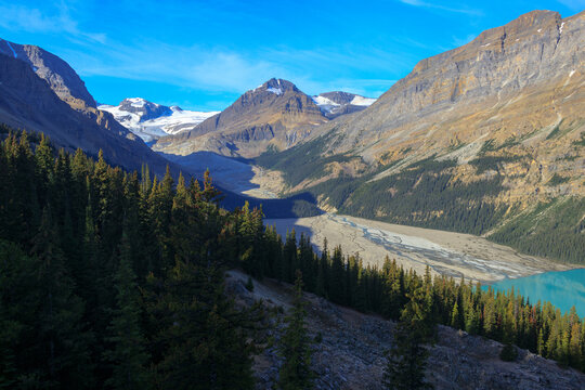 Rocky Mountains Road sideview of the iced mountains during the summer
