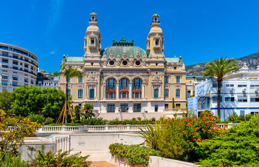 Seaside facade of Monte Carlo Opera house Salle Garnier and Casino at French Riviera coast in Monte...