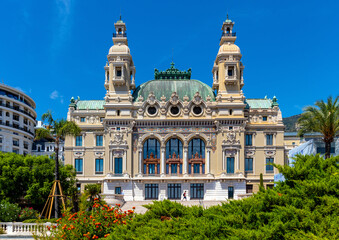 Seaside facade of Monte Carlo Opera house Salle Garnier and Casino at French Riviera coast in Monte...