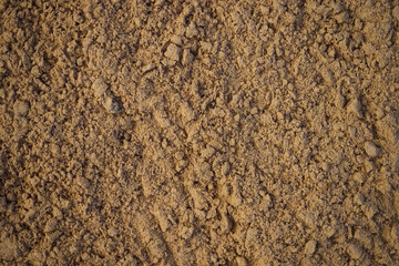 River sand. Blank textured surface. Background with space to copy. Building material.
