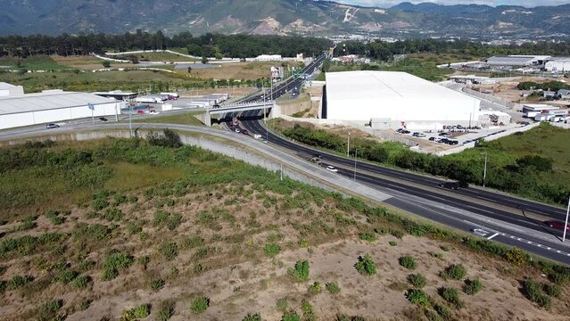 Aerial view of cars driving on the CA9 Road in Guatemala City, Villa Nue