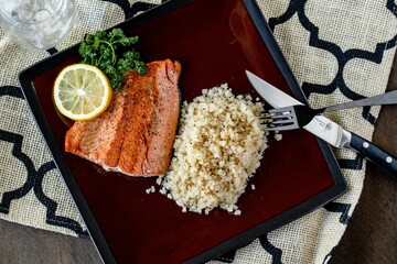 High angle shot of a salmon and rice meal