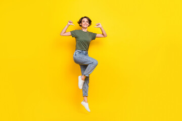 Fototapeta na wymiar Full length photo of excited cheerful lady dressed stylish clothes direct thumbs herself empty space isolated on yellow color background