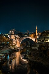 Vertical shot of the Mostar Bridge in Bosnia and Herzogovina at night