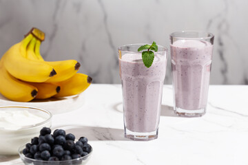 blueberry smoothie on white background