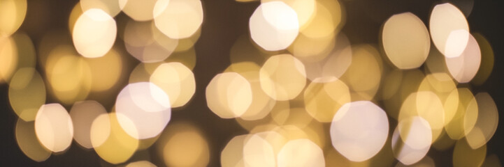 Banner of abstract holiday blurred background with different orange lights