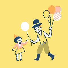 女の子に風船を手渡す大道芸人の男性