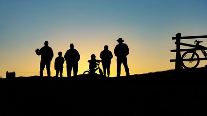 Fototapeta na wymiar silhouette of a group of people