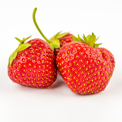 freshly picked natural strawberries from the garden. isolated on white.