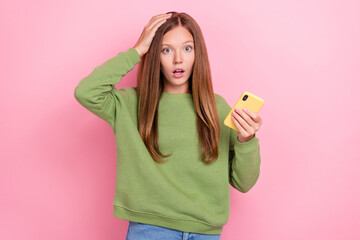 Photo of confused stressed worried girl with straight hairdo green sweater hold smartphone hand on...