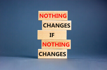 Nothing change symbol. Concept words Nothing changes if nothing changes on wooden blocks. Beautiful grey table grey background. Business nothing changes concept. Copy space.