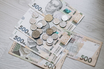 Paper and metal coin money of Ukraine. Currency of Ukraine. Ukrainian hryvnia pennies. 500 hryvnia.