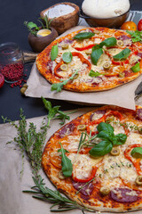 Delicious fresh pizza on dark - 546348415