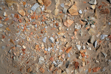 Rocks and textures patters in the sea sand next to the ocean, showing the beautiful patterns that can be formed in nature. perfect for background or backdrop.