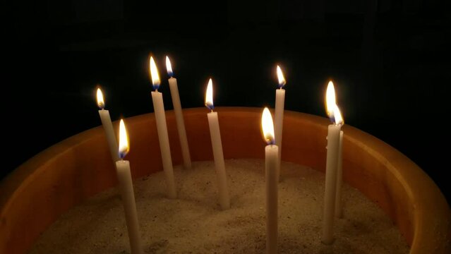 burning candles in the church, religious symbol